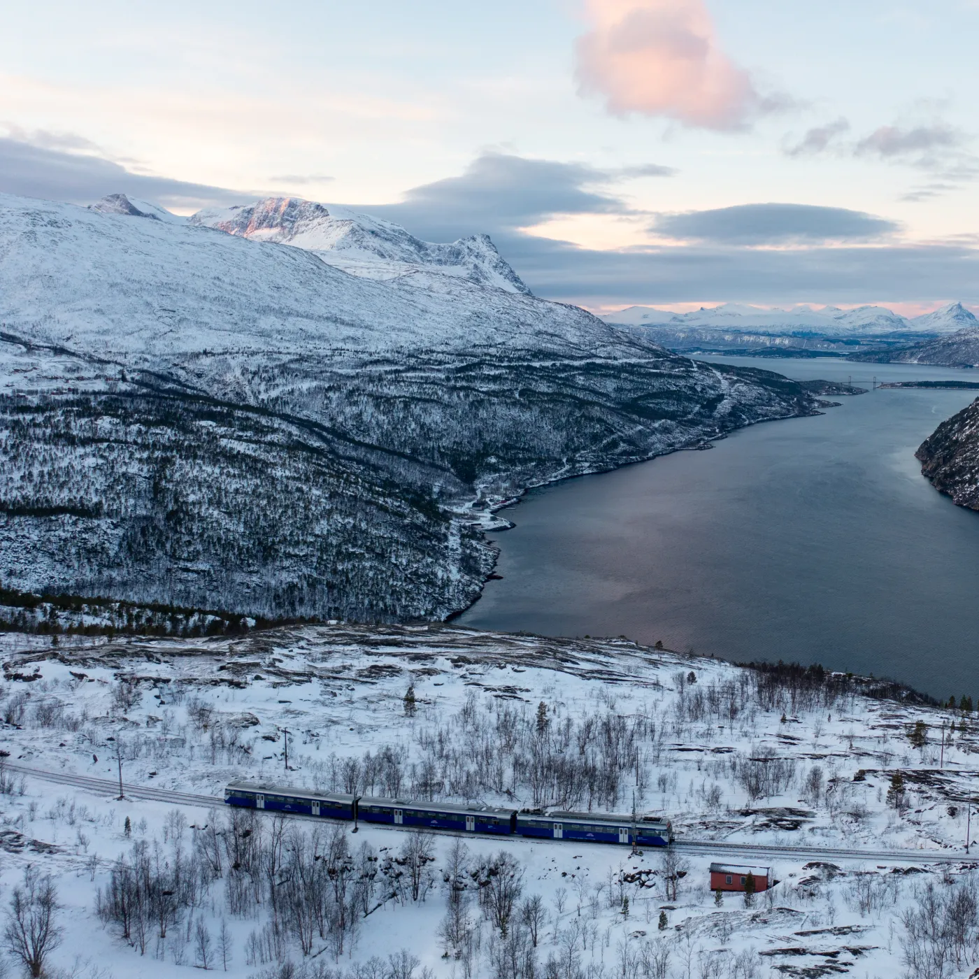 Arctic Train on the Ofotbanen railway through mountains